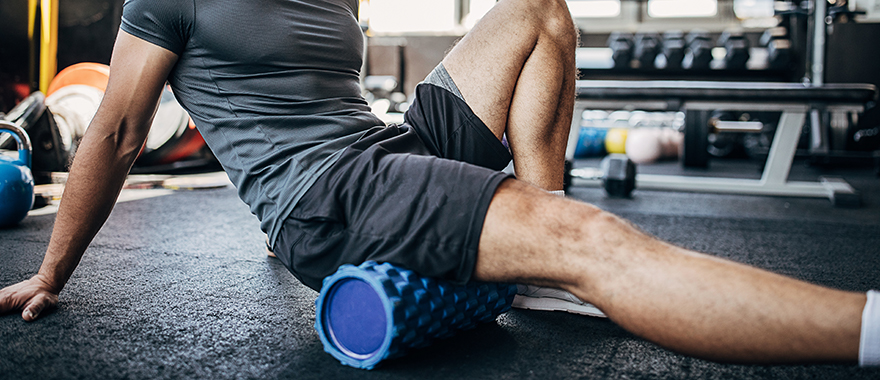 adult-male-using-foam-roller